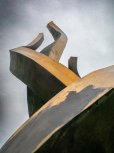 Close-up of a modern, abstract wooden sculpture, suitable for wall art prints.