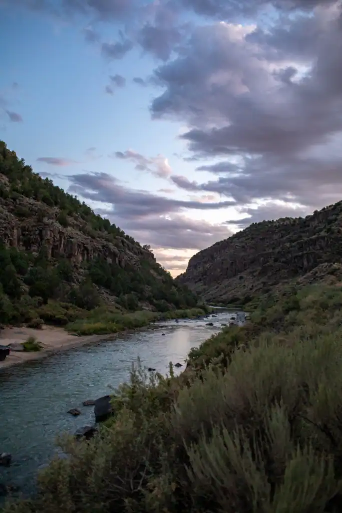River between canyon walls at dusk